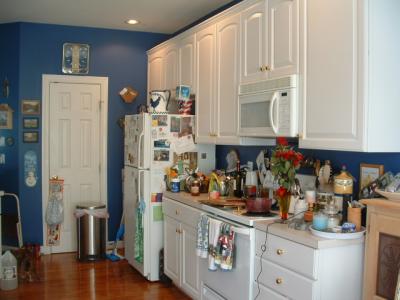 Cluttered Kitchen Counter Stove - Preparing Your Home For Sale: Part Two